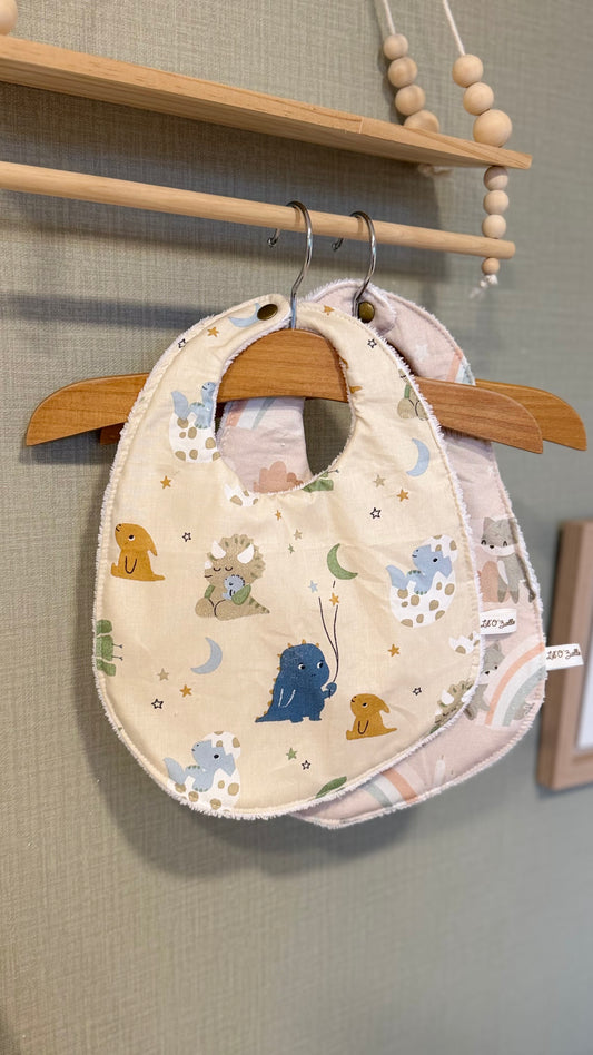 Bavoir bébé Lunelle motif petits animaux et lunes sur fond beige